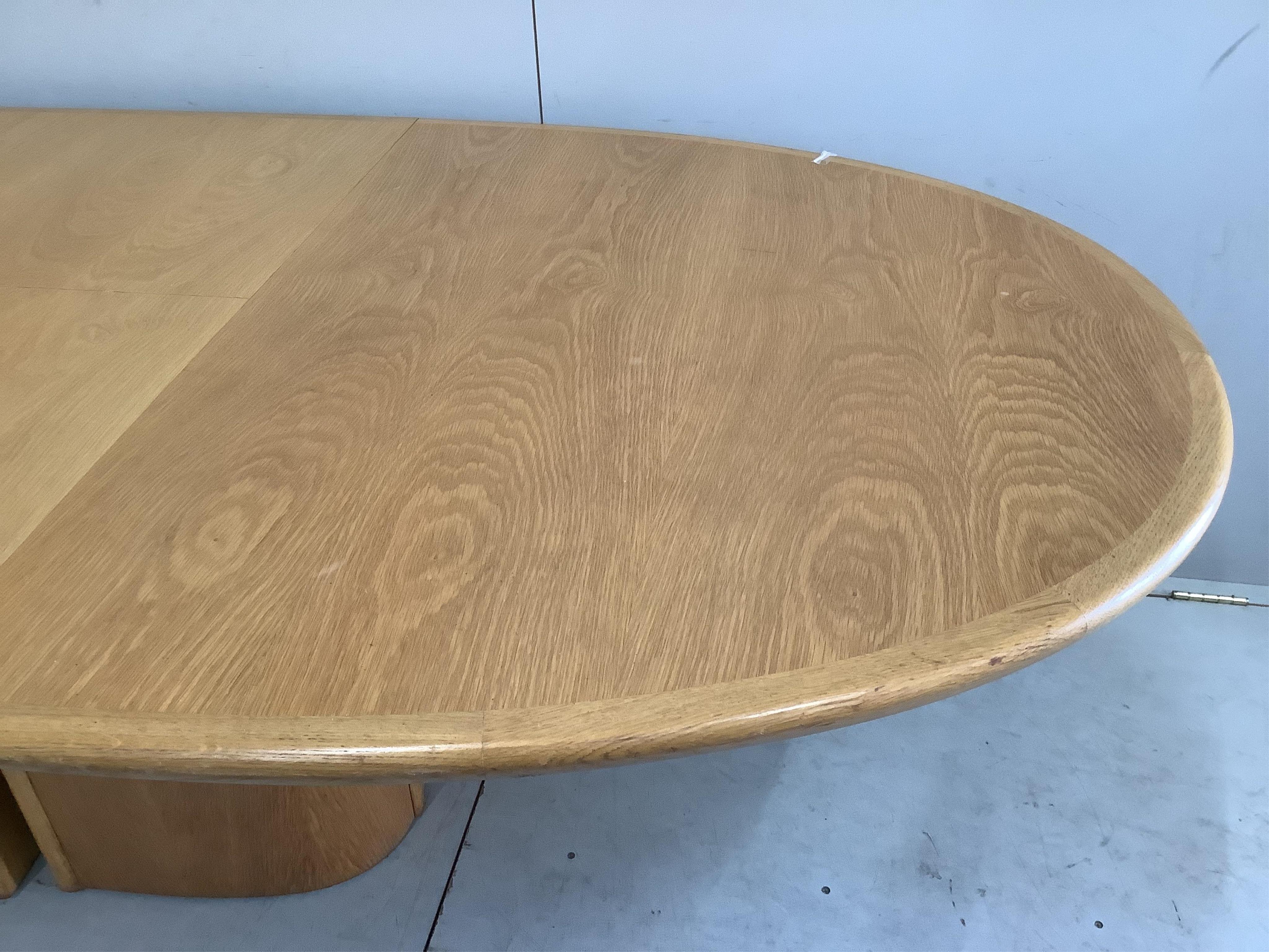 A Skovby oak extending dining table, 250cm extended, depth 108cm, height 72cm